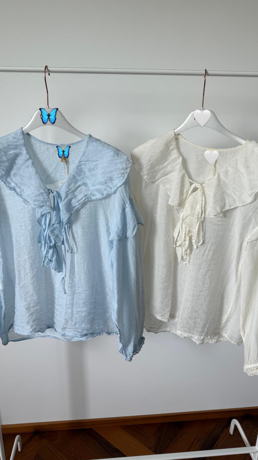 BLUSA CON ROUCHES
